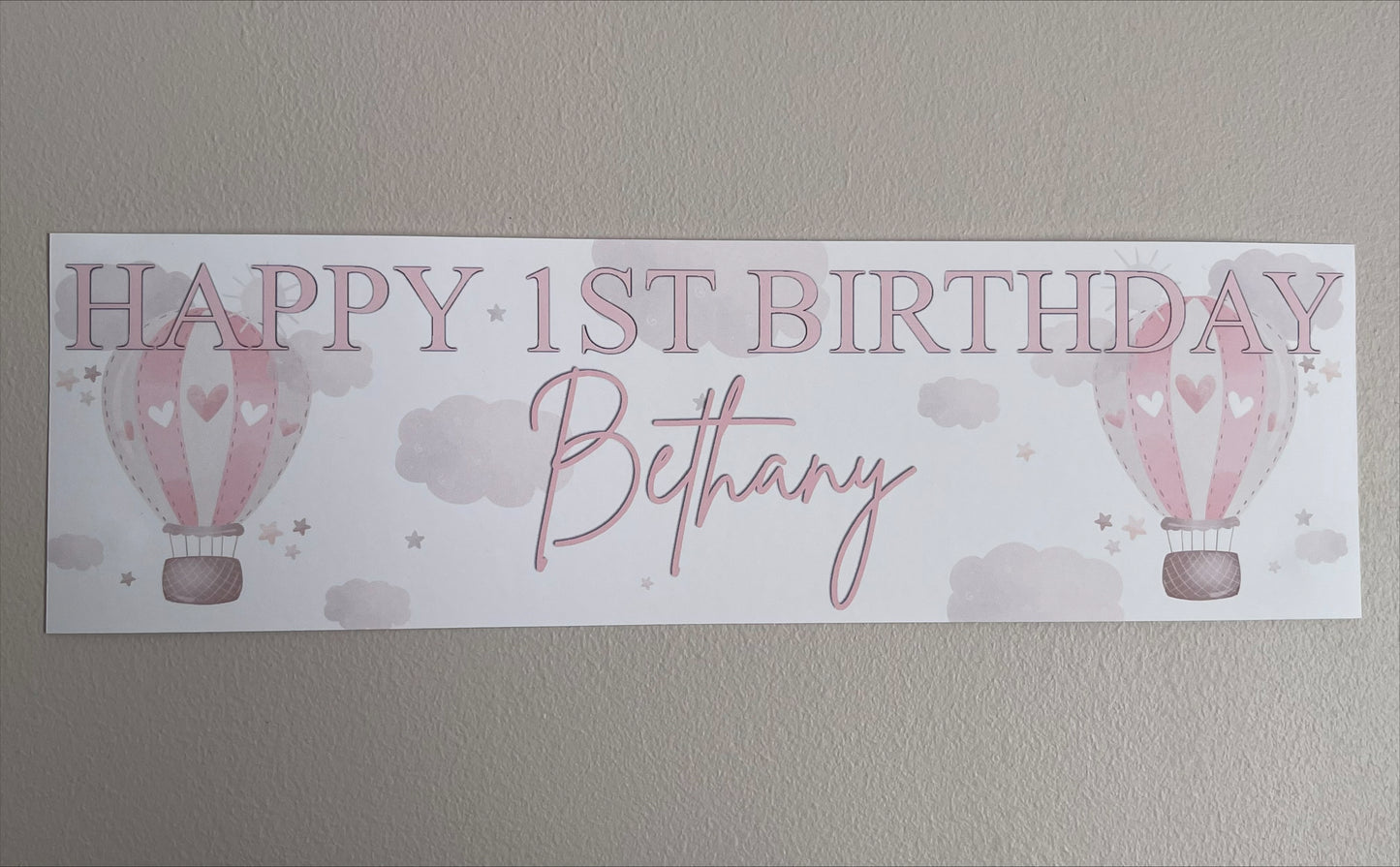 in the sky 1st birthday banner in pink personalised with happy 1st birthday and name