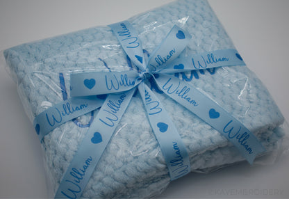 Embroidered Baby Waffle Blanket with name in Blue, embroidery is done in a darker shade gift wrapped with Ribbon