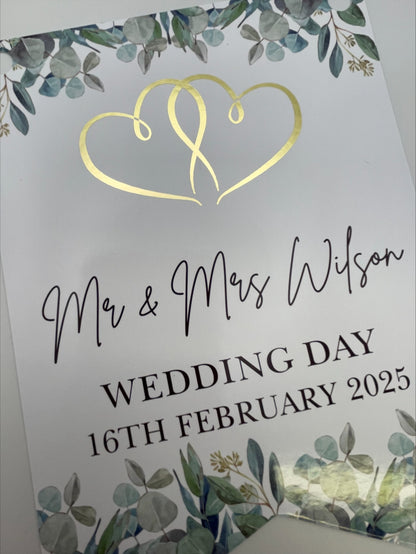 wedding bunting with eucalyptus, gold foil hearts and personalised with mr & mrs Surname, wedding day and Date. Made from 300gsm single sided gloss cardstock