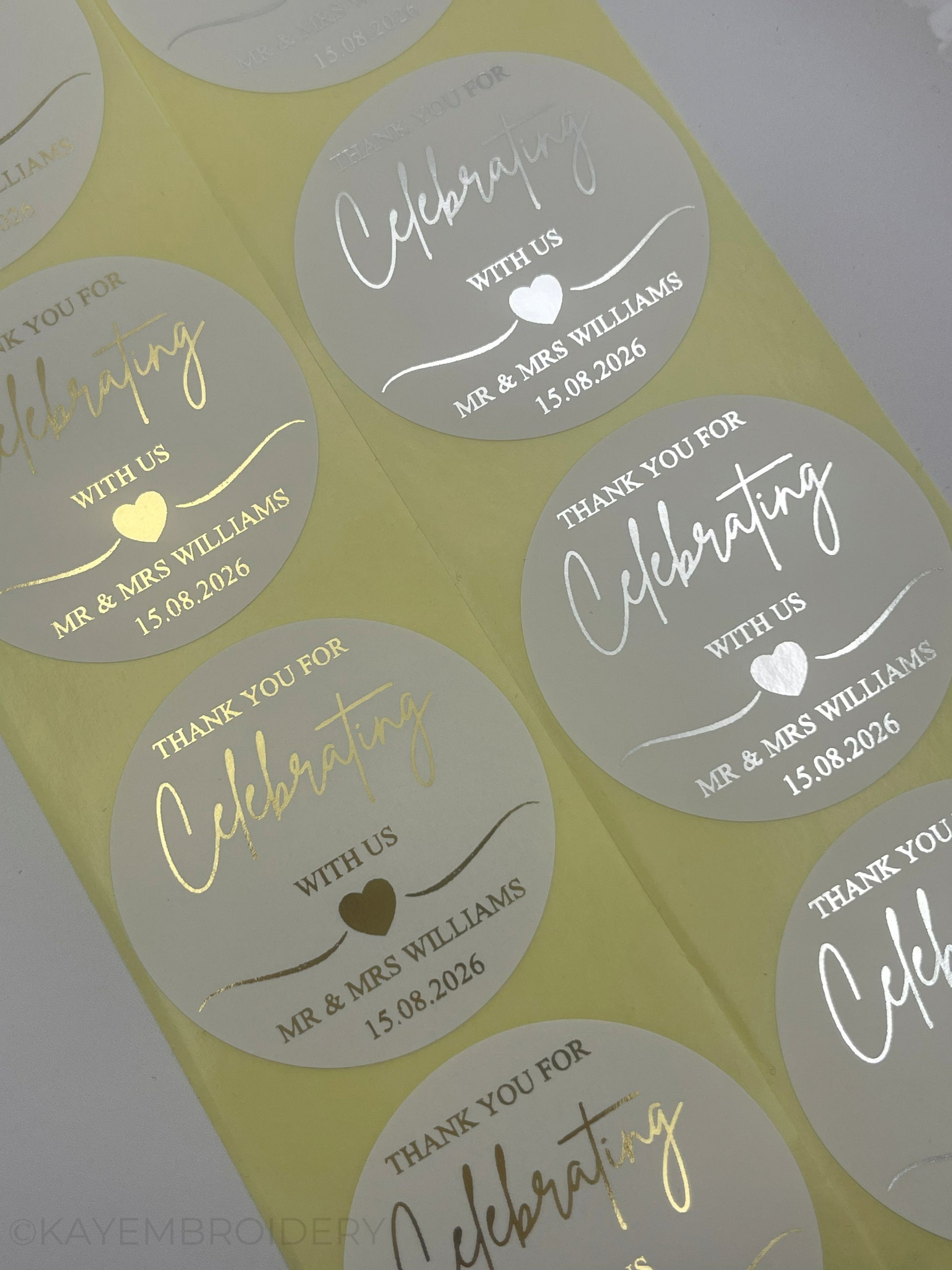 Close up of Wedding Thank you white Stickers foiled in gold or silver personalised with names and date