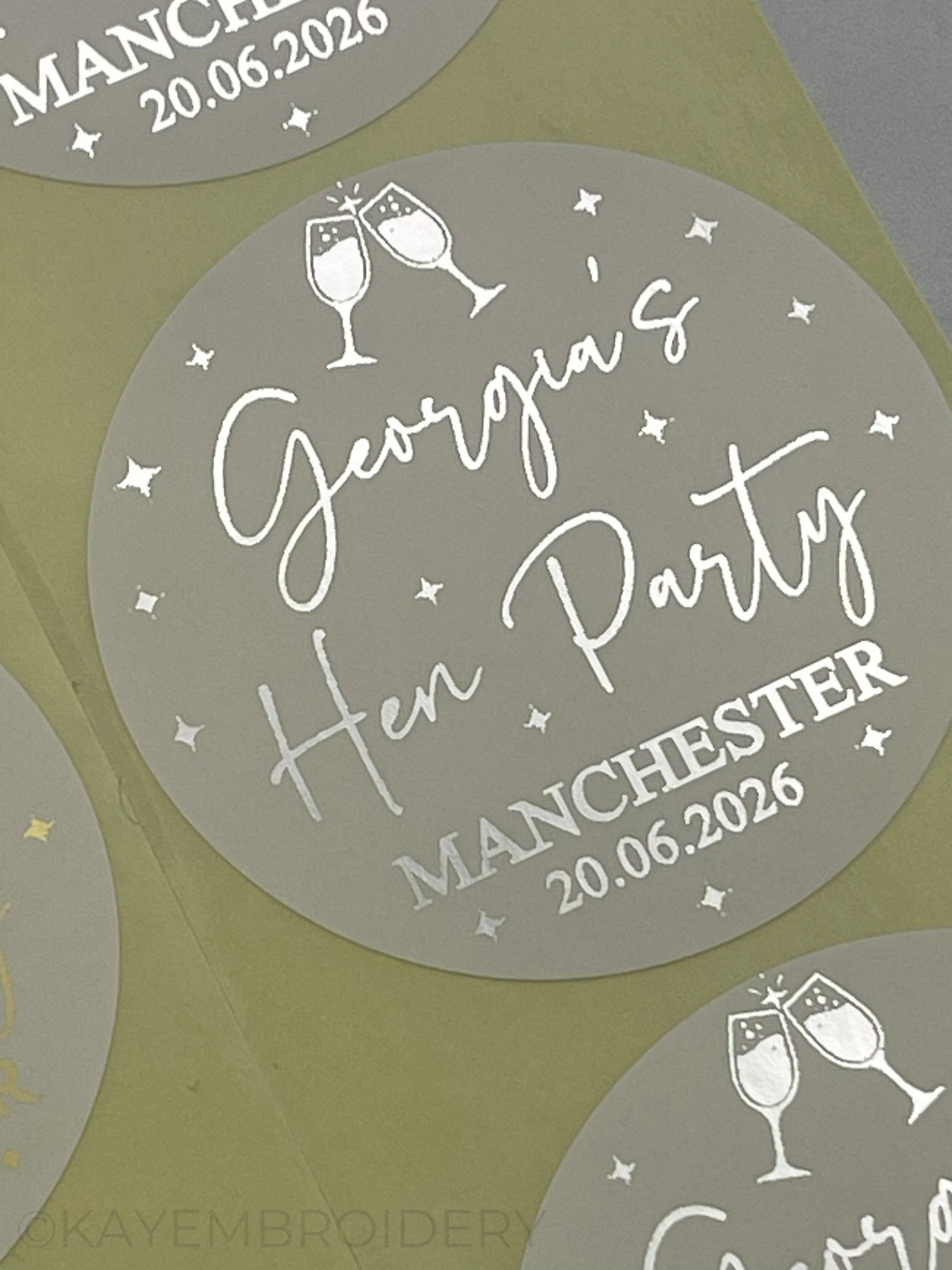 Close up of Hen party silver Foiled Stickers personalised with name and date