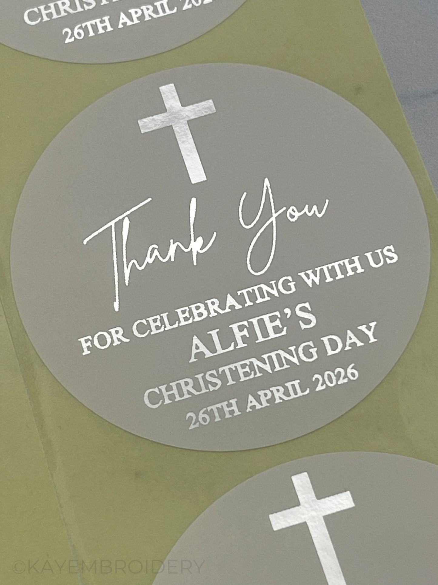 Close up of Christening or Baptism with Cross White thank you Stickers foiled in silver, personalised with name and date