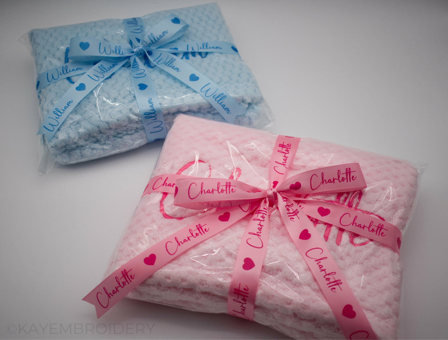 Embroidered Baby Waffle Blanket with name in Pink or Blue, embroidery is done in a darker shade gift wrapped with Ribbon