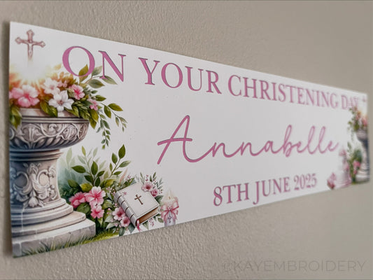 Christening or baptism celebration banner with font and flowers personalised with name and date in pink
