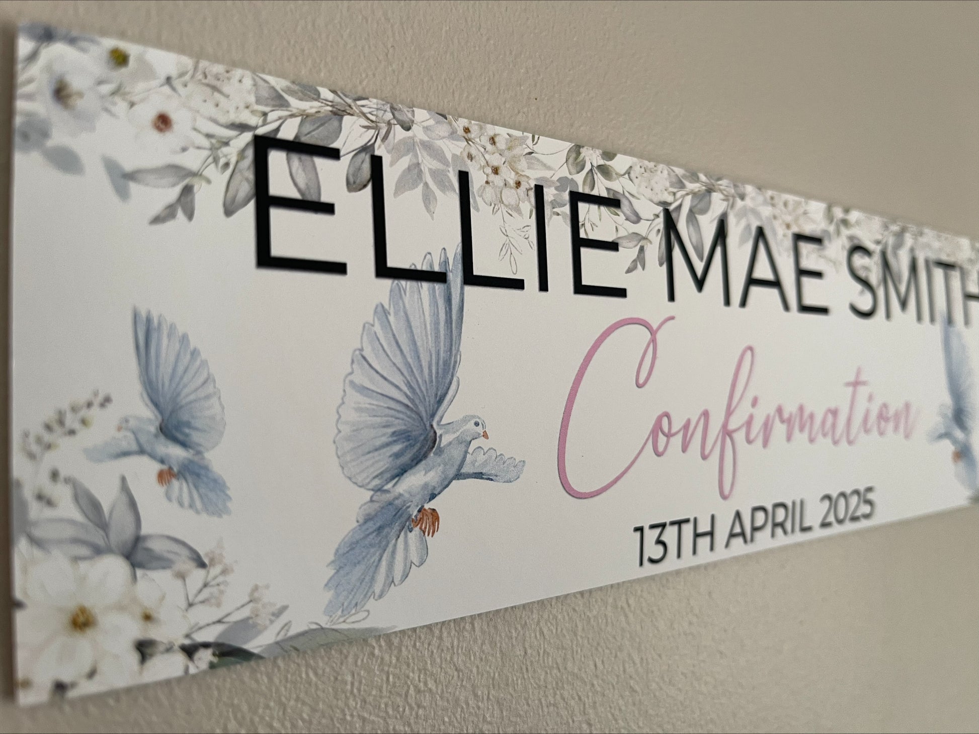 Confirmation banner with dove and white flowers personalised with name and date in pink