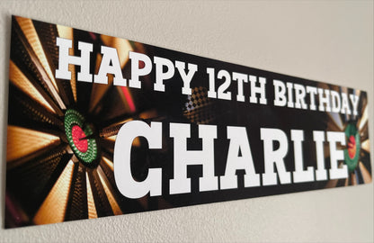 Darts Black birthday banner with dartboard and darts. Personalised with happy age birthday and name