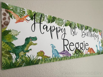 Birthday banners featuring a watercolour dinosaurs theme, t rex, triceratops, stegosaurus. Personalised with happy age birthday and name