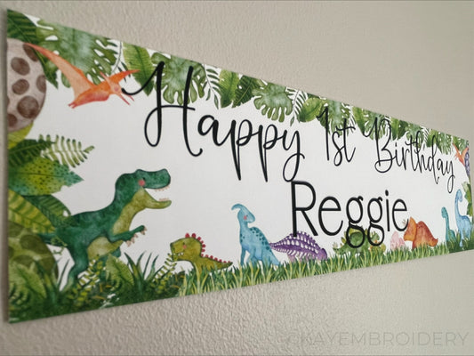 Birthday banners featuring a watercolour dinosaurs theme, t rex, triceratops, stegosaurus. Personalised with happy age birthday and name
