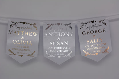 Foiled Engagement or Anniversary Bunting with greenery and hearts design in Gold, Silver, Rose Gold. Personalised with Congratulations, Names and Date. Made from 300gsm single sided gloss card