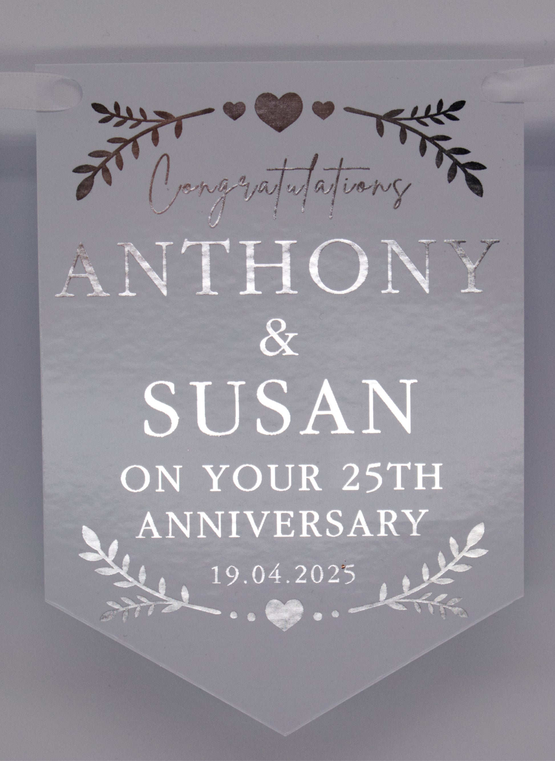Foiled Engagement or Anniversary Bunting with greenery and hearts design in Silver. Personalised with Congratulations, Names and Date. Made from 300gsm single sided gloss card