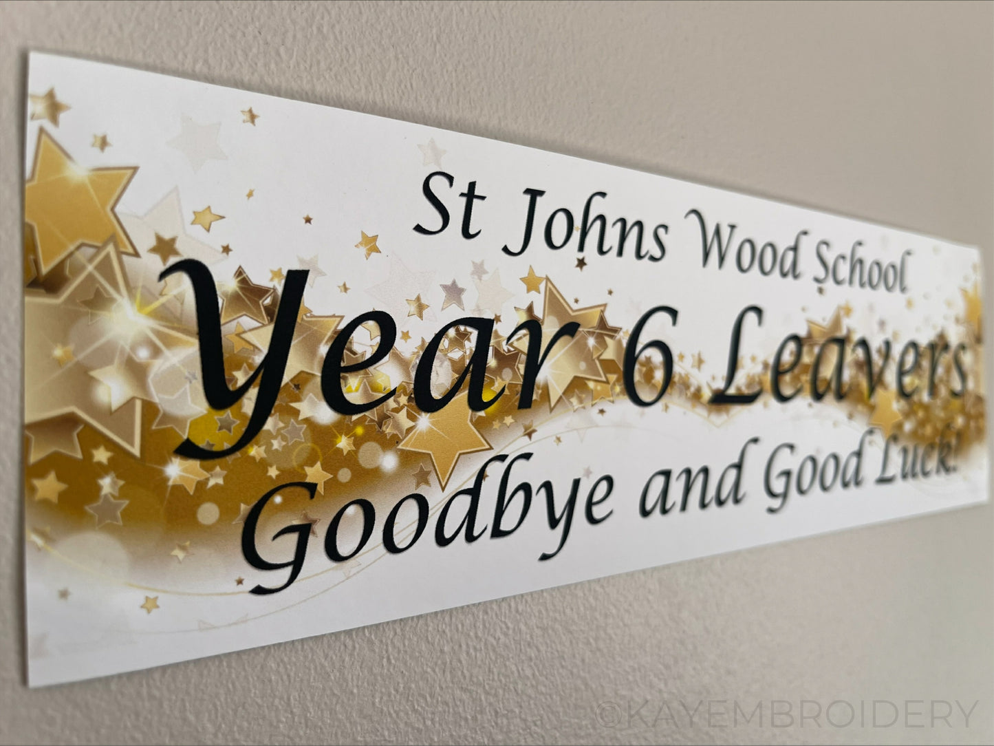 Year 6 Leavers Banner with wave of gold Stars with school name, year 6 leavers and goodbye and good luck underneath