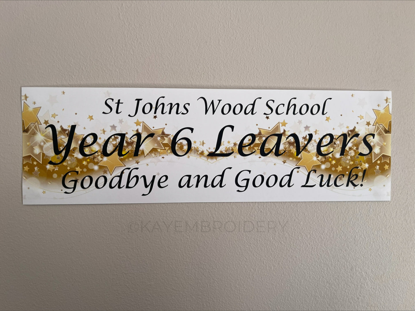 Year 6 Leavers Banner with wave of gold Stars with school name, year 6 leavers and goodbye and good luck underneath