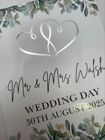 wedding bunting with eucalyptus, Silver foil hearts and personalised with mr & mrs Surname, wedding day and Date. Made from 300gsm single sided gloss cardstock