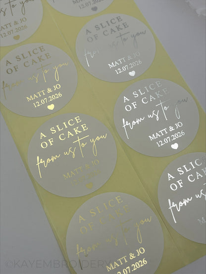 Close up of Wedding Cake thank you white Stickers foiled in gold or silver personalised with name and date