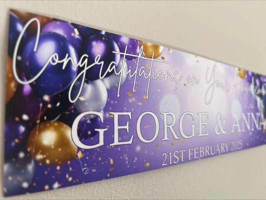 Engagement Banner in purple and gold with white text, personalised with names and date