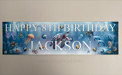 Under the sea birthday banner with marine sea life such as Turtle, Fish, Jellyfish, Octopus theme. Personalised with happy age birthday and name