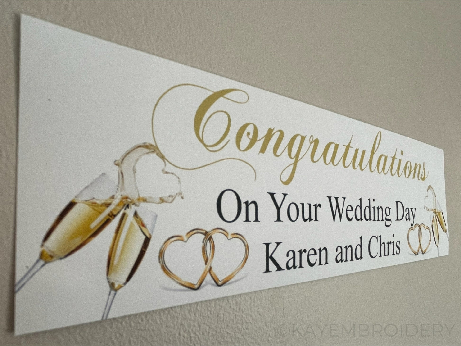Congratulations banner for wedding personalised with champagne and hearts design in gold